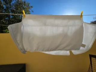 Minicuna blanca con ruedas