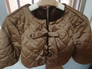 Torera marrón acolchada