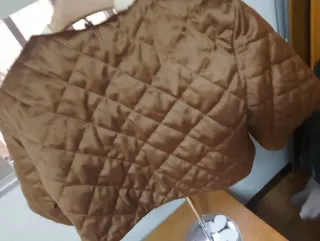 Torera marrón acolchada