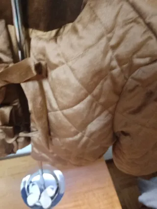 Torera marrón acolchada