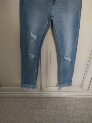 Jeans bambina strappati