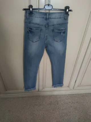 Jeans bambina strappati