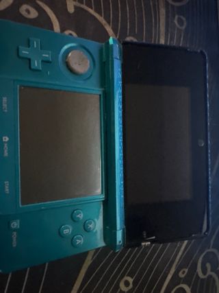 Nintendo 3DS azul y juegos