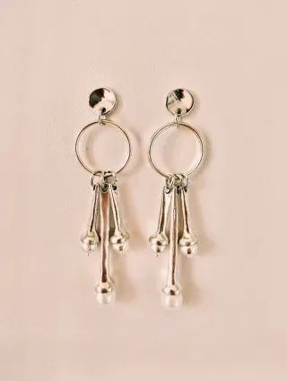 Pendientes estilo Uno de 50.