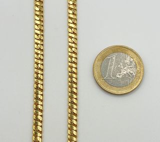 Cadena barbada de oro de 18k. Peso: 36.18 gr.