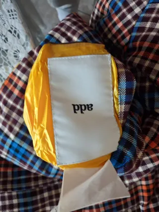 Piumino imbottito double face   con cappuccio