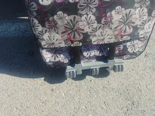 Dos maletas XXL marca misiuss una 6 ruedas dobles