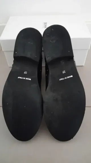 Stivaletti neri con borchie