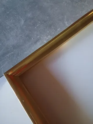 Marco de fotos dorado madera y metal