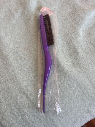 Peine púrpura con cola