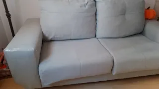 Sofa verde dos plazas