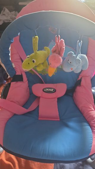 Hamaca Jane bebé rosa con juguetes