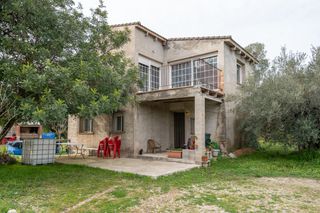 Finca con casa de campo y agua de pozo comunitario