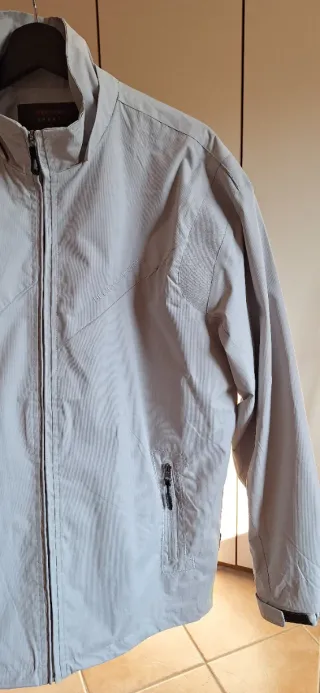 Giacca impermeabile anti pioggia beige