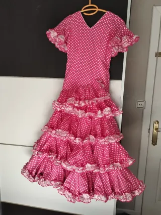 Traje de flamenca rosa lunares