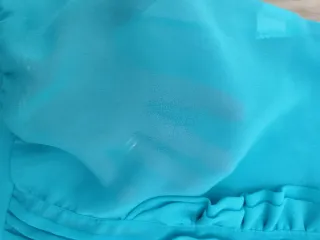 Top con fiocco e perle