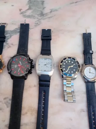 Lote 5 relojes de pila