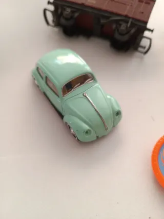 Lote de : tren, coche, bici y figuras