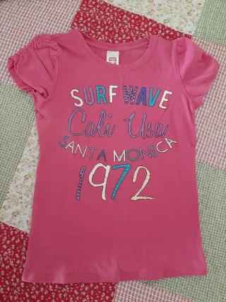 Camiseta fucsia.Talla 134-140cm.