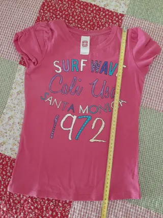 Camiseta fucsia.Talla 134-140cm.