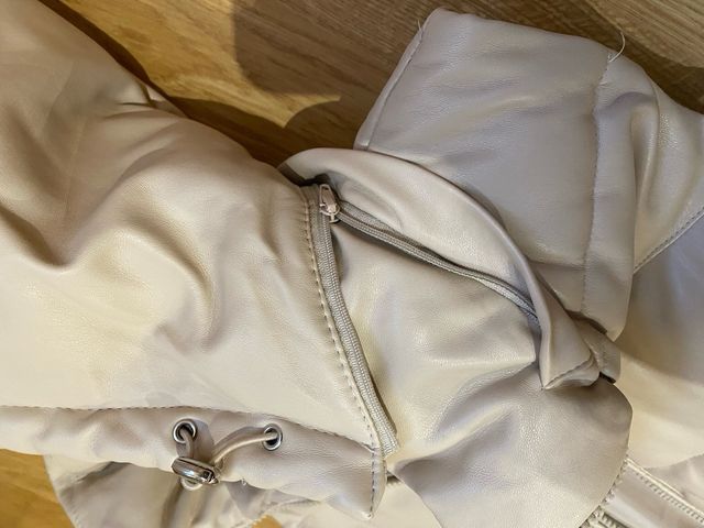 Chaleco largo acolchado con capucha