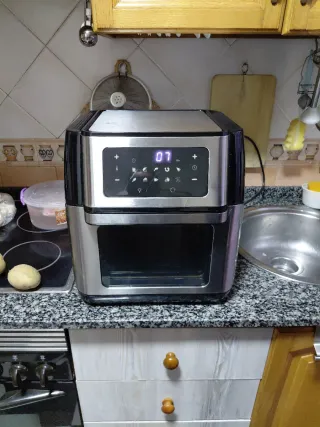 Freidora de aire sin accesorio dentro funciona