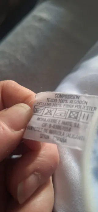 Cojín de lactancia azul con estrellas