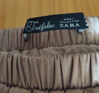 Lote 2 Faldas Talla S Beige y Estampada