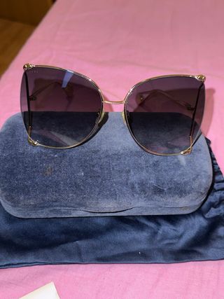 Gafas de sol Gucci doradas y marrones