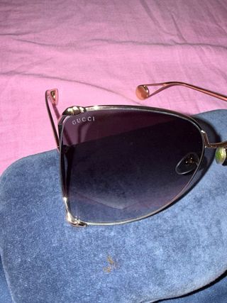 Gafas de sol Gucci doradas y marrones