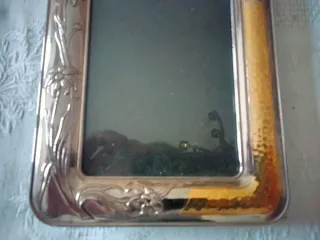 Marco de fotos plateado y dorado