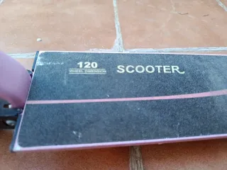 Patinete rosa con ruedas luminosas