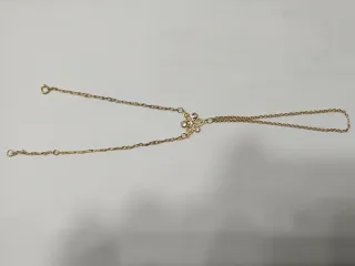 Pasamanos oro 18k con flor y piedras