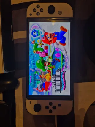 Nintendo Switch OLED + 2 Juegos