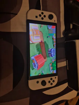 Nintendo Switch OLED + 2 Juegos