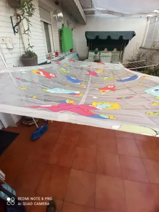 Estor infantil con mecanismo recogedor