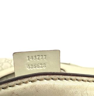 Bolso Gucci GG Canvas Beige y Dorado