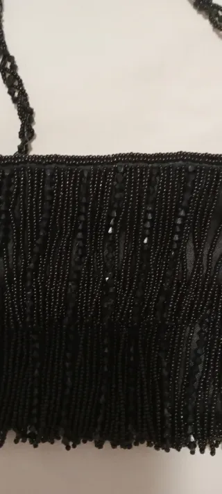 Bolso de fiesta negro con flecos