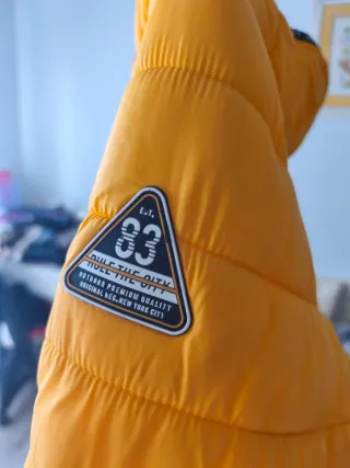Chaqueta acolchada amarilla