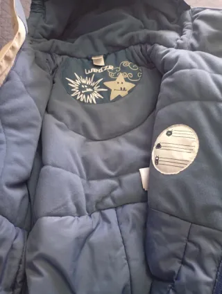 Mono de nieve infantil azul y beige