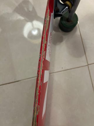 Longboard con ruedas verdes