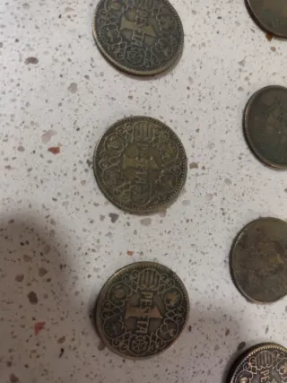 Lote de 19 Monedas de 1 peseta de 1944.