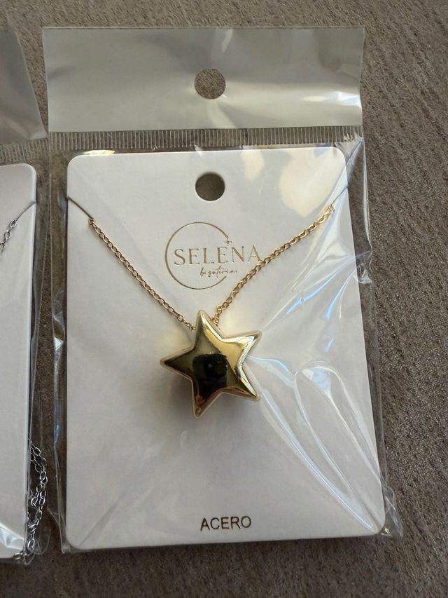 2 colgantes de Acero con estrella en dorad y plata
