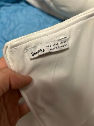 Mono/vestido blanco con cremallera y pantalón bajo