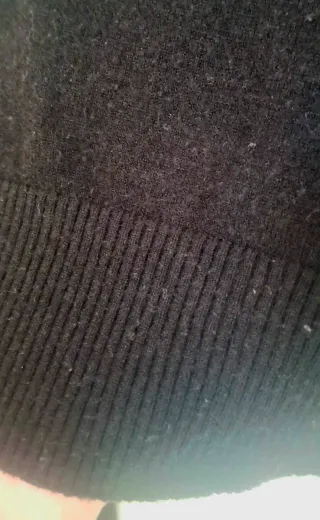 Amplio jersey de punto fino.