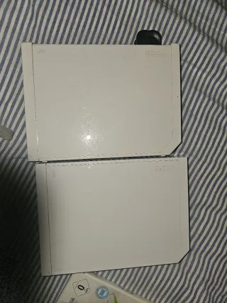 2 nintendo wii + mando + cables + juegos