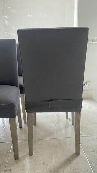 1 silla de comedor tapizada en tela gris