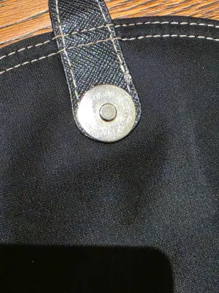 Borsa nera in tessuto tecnico e pelle