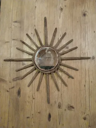 Espejo sol muy antiguo