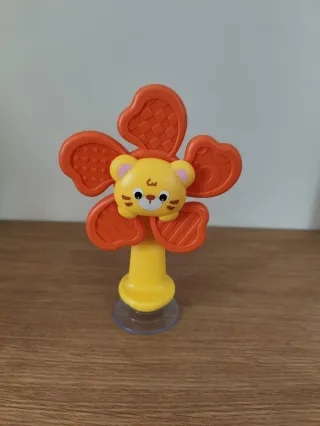 Juguete giratorio con ventosa